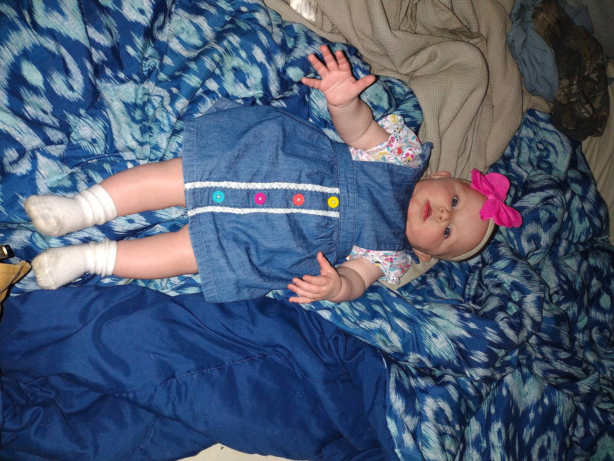 Ammi is registered to the contest to win money with this photo: baby, baby_products, baby_toddler_clothing, blue, comfort, couch, electric_blue, event, finger, fun, hand, headwear, human_body, human_leg, lap, leg, person, purple, sitting, thigh