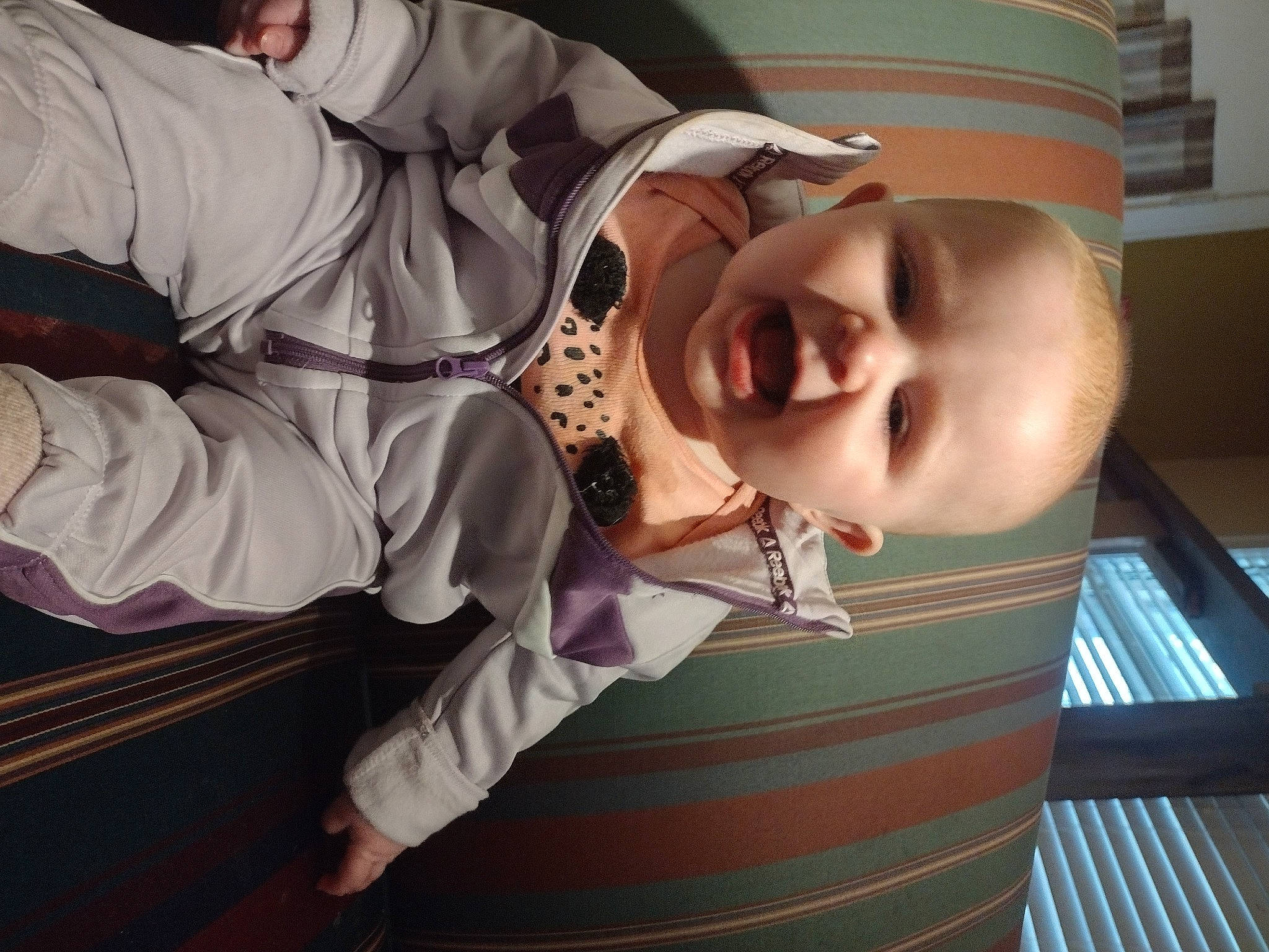 Ammi is registered to the contest to win money with this photo: baby, baby_products, baby_safety, baby_toddler_clothing, car_seat, cheek, child, comfort, eyelash, fun, happy, mouth, person, room, sitting, sleeve, smile, toddler