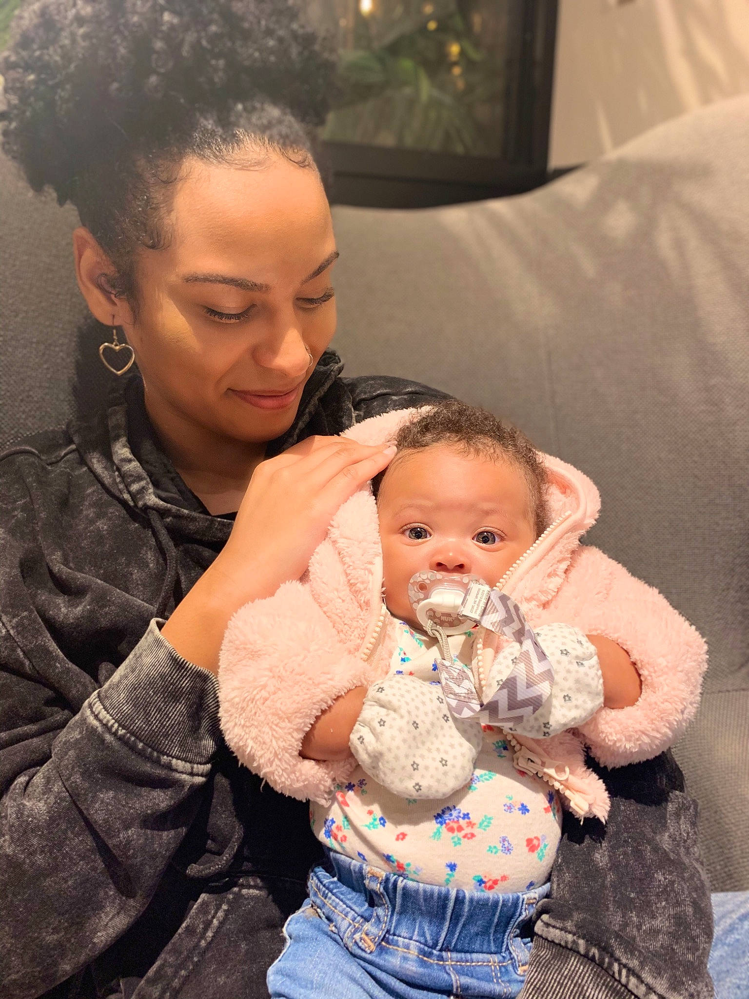 Phoenix joined the competition — help win amazing prizes! baby, cheek, comfort, couch, ear, eye, facial_expression, finger, gesture, happy, human, interaction, iris, lap, mouth, nose, organ, person, picture_frame, skin