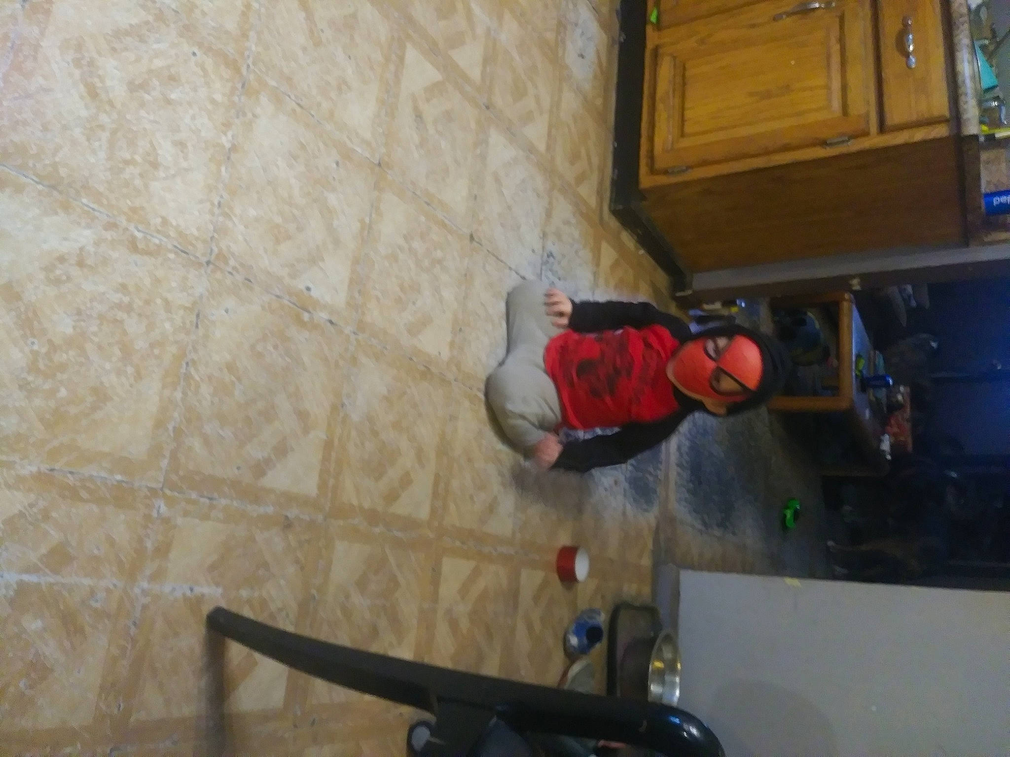 Caleb is registered to the contest to win money with this photo: box, cabinetry, ceiling, concrete, cupboard, floor, flooring, fun, hardwood, person, plaster, plywood, recreation, room, varnish, wood, wood_stain