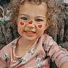 Katalaya joined the competition — help win amazing prizes! child, curly_hair, smiling, pink_sweatshirt, mickey_mouse, hearts, face_paint, indoor, cozy, couch, portrait, cute, happy, blue_eyes, freckles, casual_clothing, young_child, person, sitting, playful