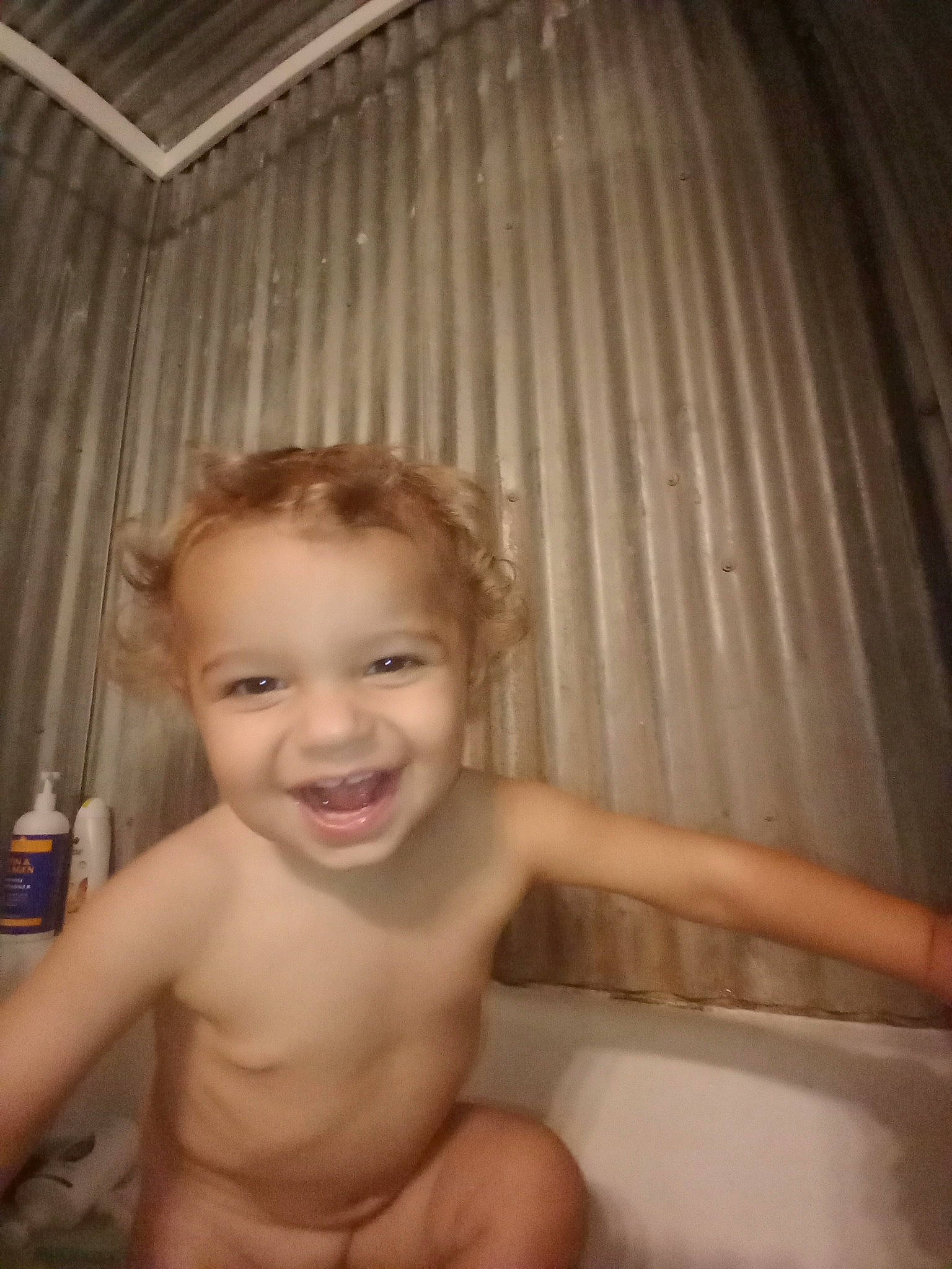 Cameron is registered to the contest to win money with this photo: arm, bathroom, bathtub, cheek, chin, curtain, eye, eyebrow, facial_expression, finger, fluid, hand, human_body, iris, joy, lip, mouth, muscle, nose, person