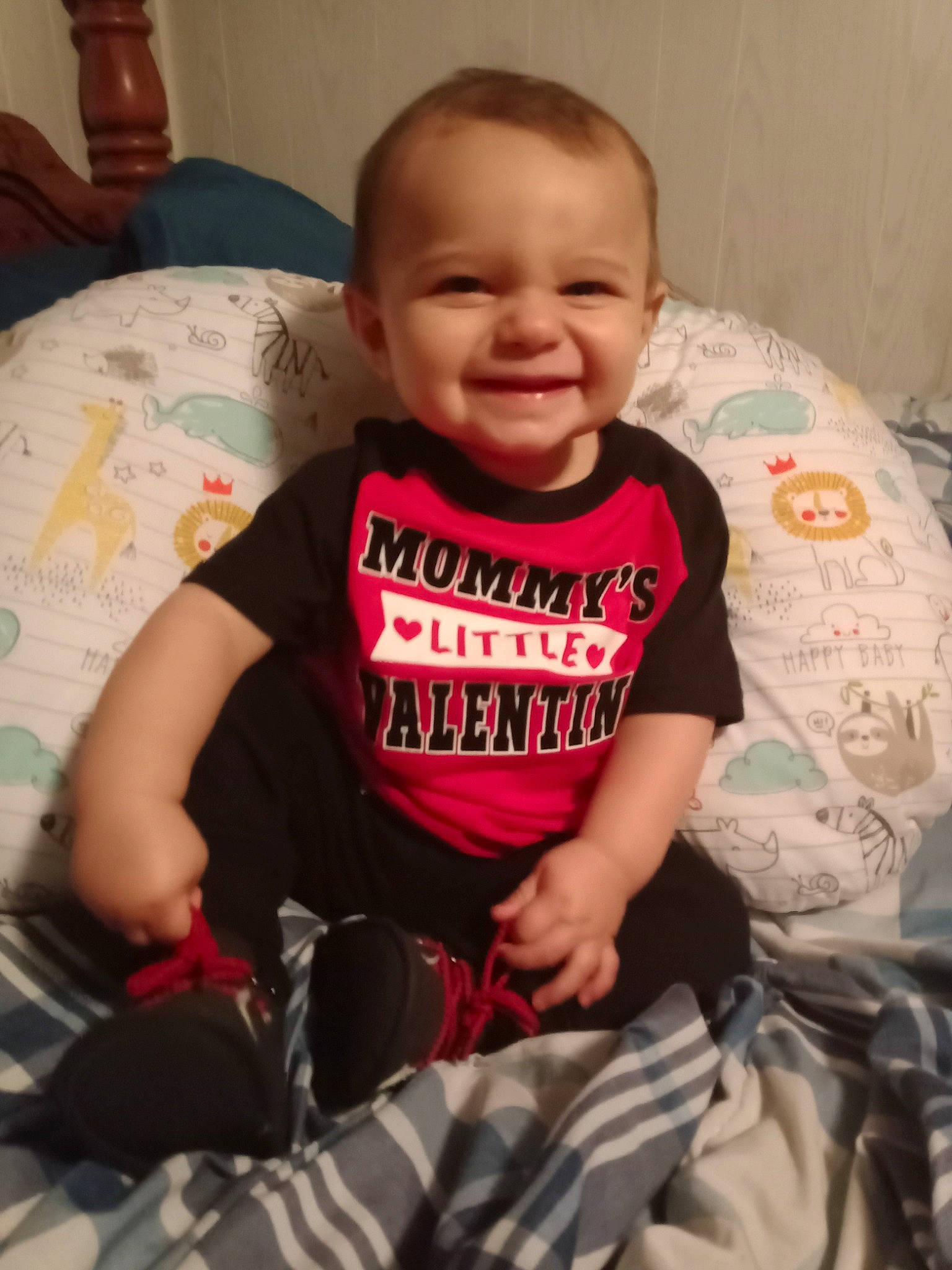 Cameron is registered to the contest to win money with this photo: baby, baby_toddler_clothing, cheek, comfort, face, finger, hairstyle, happy, head, human_body, joy, mammal, mouth, neck, person, pink, skin, sleeve, smile, t_shirt