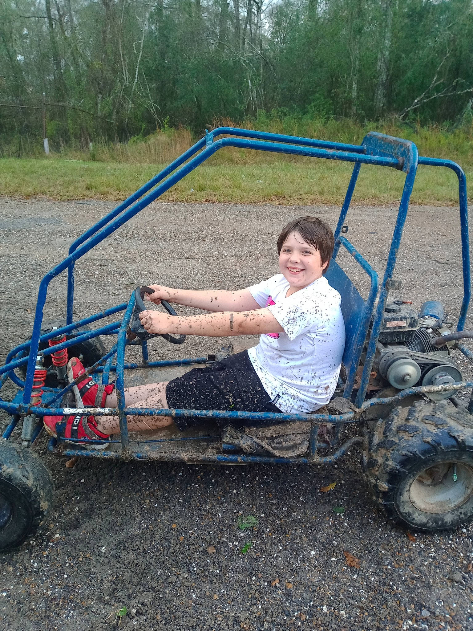 Tristen joined the competition — help win amazing prizes! auto_part, automotive_design, automotive_exterior, automotive_tire, automotive_wheel_system, bumper, car, fender, fun, joy, motor_vehicle, person, plant, recreation, rim, soil, tire, tread, tree, vehicle