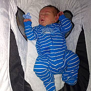 Jaxper joined the competition — help win amazing prizes! baby, bed, bedroom, blanket, clothing, cradle, crib, face, furniture, head, indoors, infantbed, newborn, pajamas, person, room