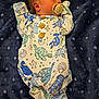 newborn, baby, pacifier, onesie, turtle_pattern, blanket, blue, white, infant, lying_down, soft_texture, sleepwear, cute, child, young, face, head, clothing, comfort, rest