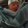 Oakleigh joined the competition — help win amazing prizes! newborn, baby, blanket, hat, face, infant, cozy, soft, wrapped, cute, indoors, resting, warm, clothing, sleepwear, texture, person, headwear, portrait, lying_down