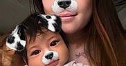 Robert is registered to the contest to win money with this photo: baby, child, clothing, cute, digital_filter, dog_filter, face_filter, family, fun, hand, happy, holding, indoor, long_hair, person, portrait, selfie, skin, smile, woman