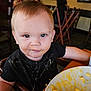 Finnigan joined the competition — help win amazing prizes! black_shirt, child, curious, cute, eating, eyes, face, food, hair, high_chair, indoor, macaroni_and_cheese, meal, messy, person, plate, restaurant, seat, table, toddler