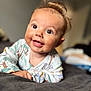 Jude is registered to the contest to win money with this photo: baby, infant, smiling, face, eyes, hair, pajamas, blanket, bed, cute, child, portrait, happy, expression, skin, hand, indoors, soft, closeup, focus