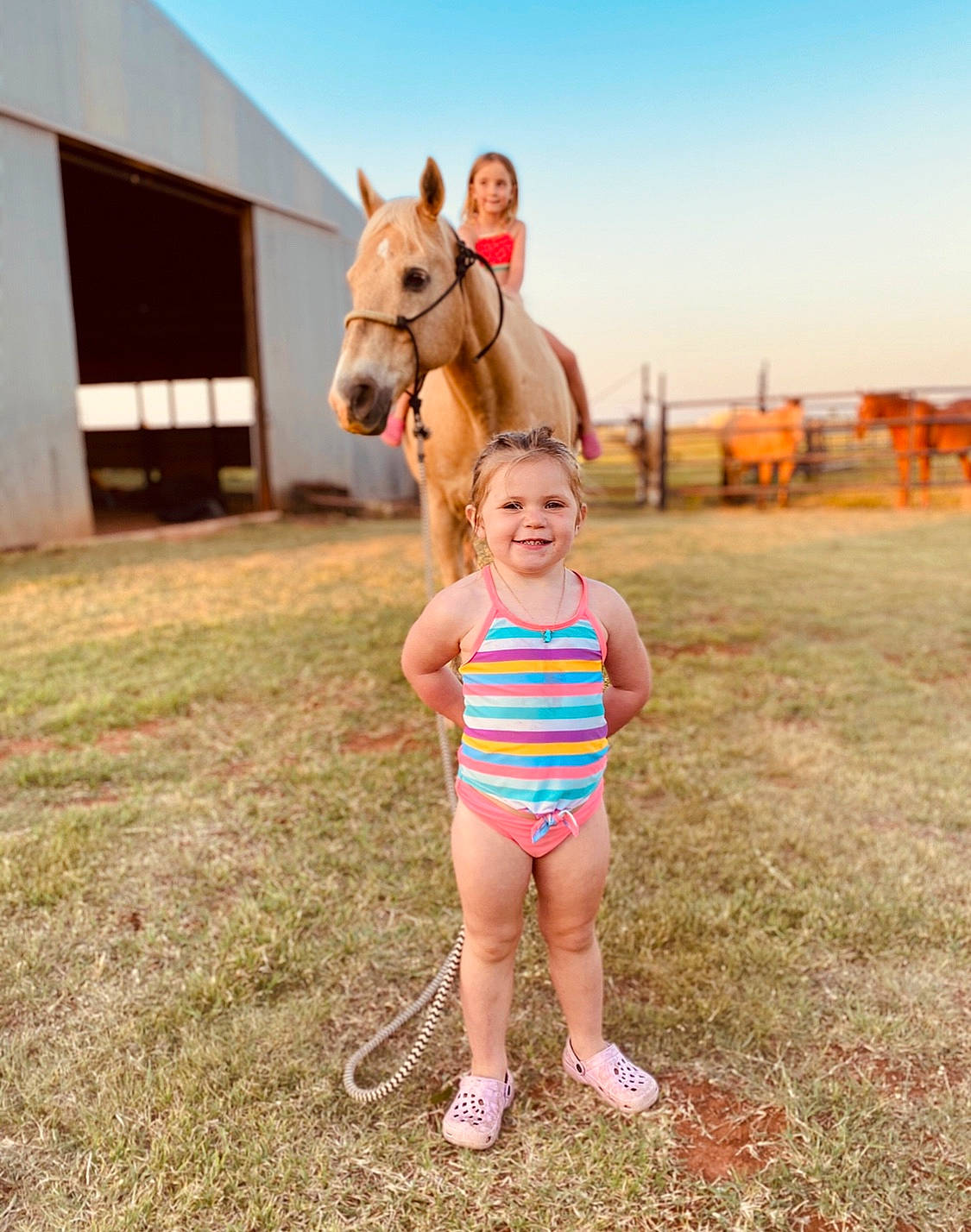 Jentry is registered to the contest to win money with this photo: blurred, child, family, farm, fawn, fun, grass, happy, horse, joy, landscape, people, person, photograph, photography, plant, play, recreation, smile, summer