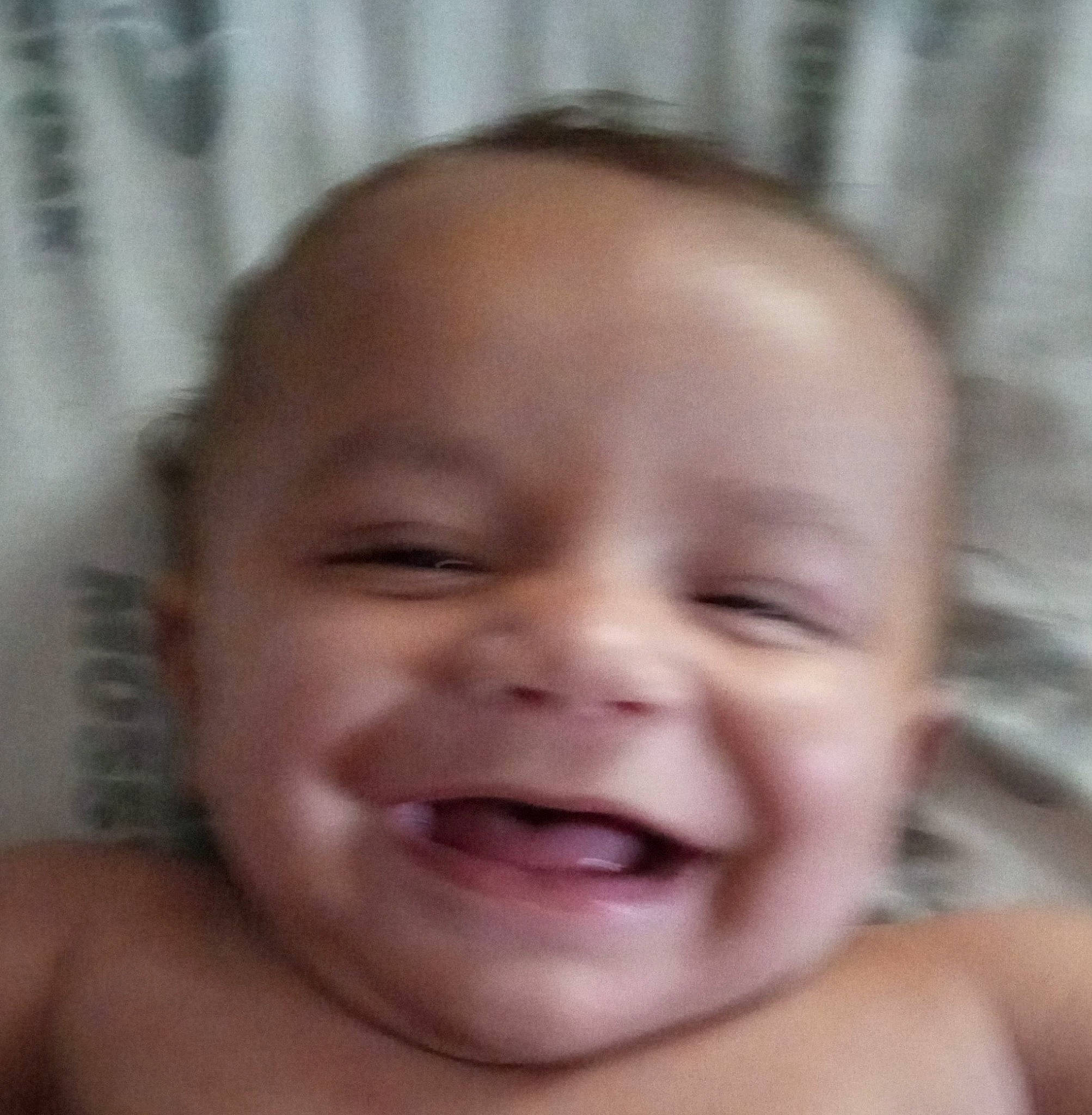 Darrell is registered to the contest to win money with this photo: baby, baby_laughing, cheek, ear, eye, eyebrow, eyelash, forehead, gesture, happy, iris, jaw, joy, lip, mouth, nose, person, skin, smile, thumb