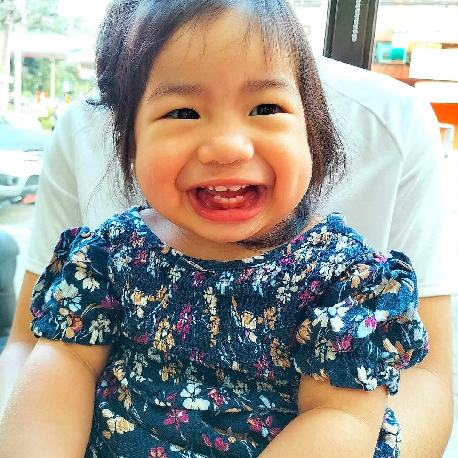 Kamila is registered to the contest to win money with this photo: accessories, baby, babylaughing, blouse, bodypart, clothing, dress, face, happy, head, jewelry, laughing, mouth, necklace, person, photography, portrait, smile, t_shirt, teeth