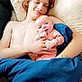 Penelope joined the competition — help win amazing prizes! baby, bedroom, blanket, child, clothing, comfort, couch, face, family, hair, hand, holding, home, indoor, pillow, relaxing, skin, smiling, tattoo, young_person