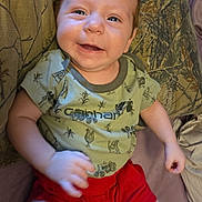 Hayes joined the competition — help win amazing prizes! baby, smiling, child, infant, happy, face, clothing, shorts, tshirt, sitting, cushion, pattern, indoor, cute, person, skin, head, hand, eyes, mouth