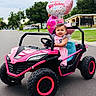 toddler, birthday, toy_car, pink, balloons, dress, crown, smile, outdoor, street, suburban, child, celebration, happy, vehicle, one_year_old, daytime, grass, house, road