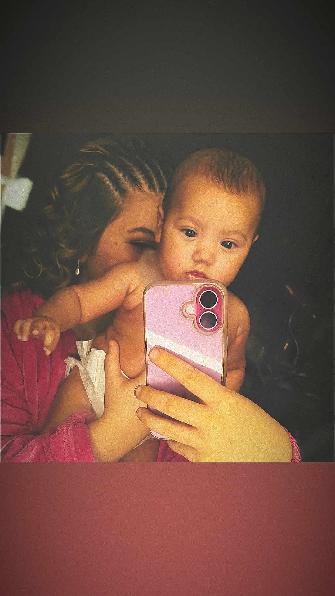 Nova Rose joined the competition — help win amazing prizes! baby, person, selfie, smartphone, hand, braided_hair, robe, indoor, portrait, child, skin, face, holding, curly_hair, diaper, closeup, expression, technology, phone_case, warm_lighting