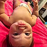 Nova Rose joined the competition — help win amazing prizes! baby, infant, child, skin, diaper, blanket, pink, lying_down, arms_up, curious, indoors, soft_lighting, chubby_cheeks, face, eyes, hair, playful, closeup, portrait, person