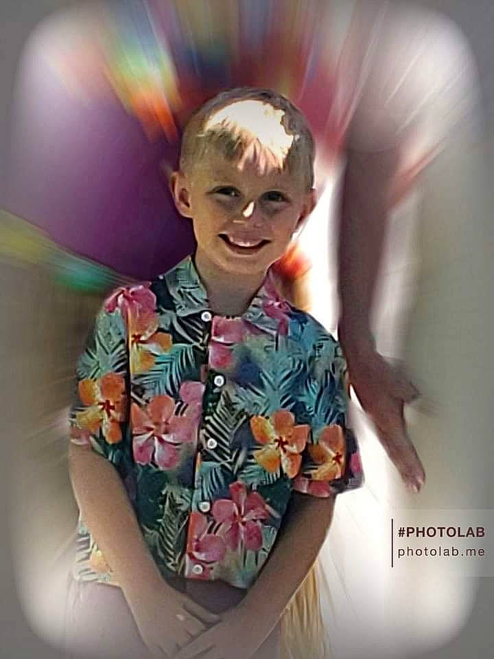 Dustin is registered to the contest to win money with this photo: artist, child, electric_blue, entertainment, event, fashion_design, flash_photography, flower, fun, gesture, happy, joy, laugh, magenta, performing_arts, person, pink, shoulder, sitting, sleeve