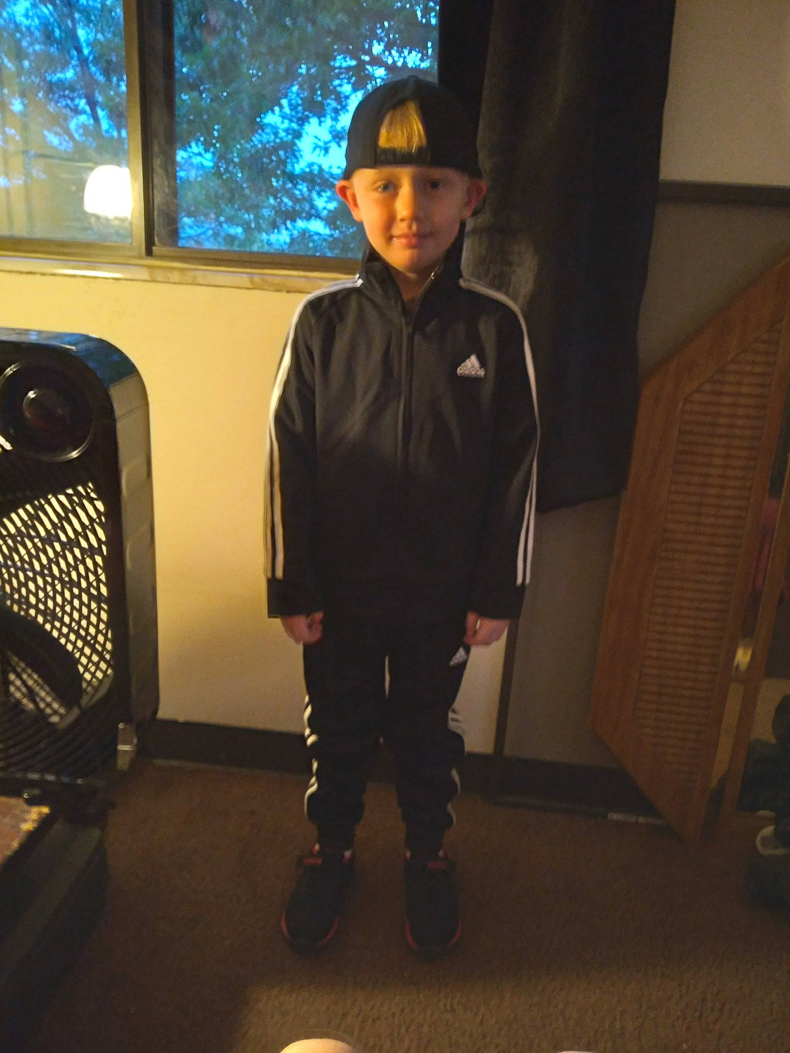 Dustin joined the competition — help win amazing prizes! bag, boot, cap, chair, child, electric_blue, flooring, fun, headwear, helmet, hoodie, luggage_and_bags, person, personal_protective_equipment, recreation, room, sitting, sports_equipment, sports_gear, toddler