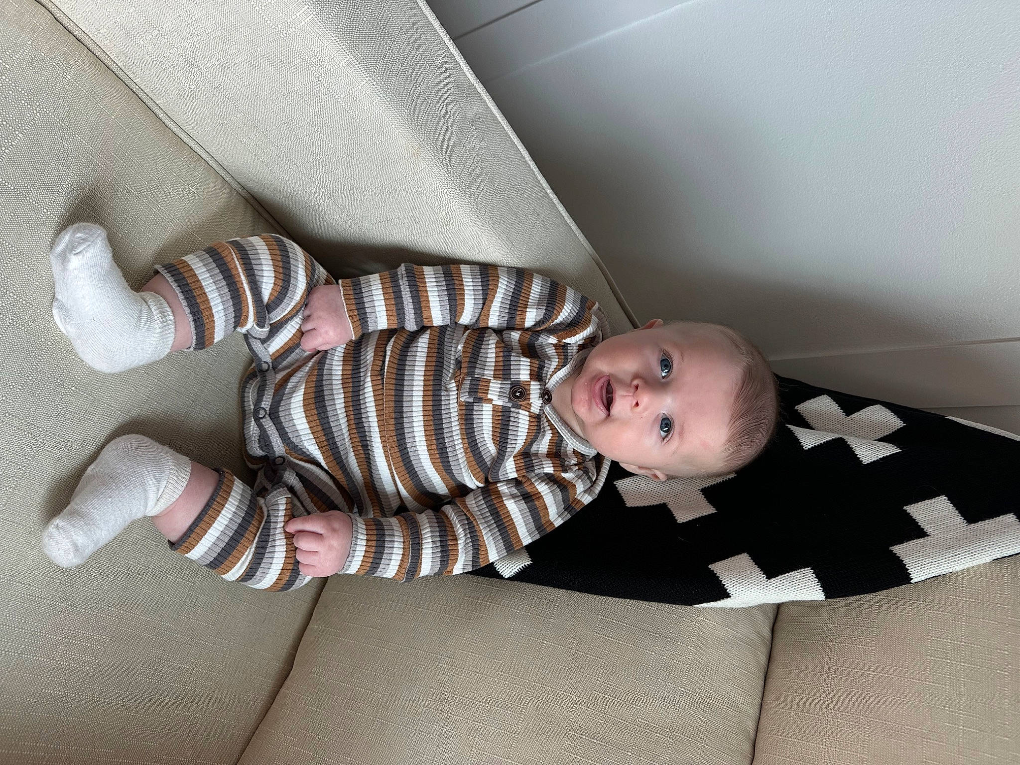 Colter joined the competition — help win amazing prizes! arm, baby, baby_products, baby_toddler_clothing, child, comfort, finger, flash_photography, floor, flooring, hardwood, human_leg, linens, pattern, person, room, sitting, sleeve, sock, toddler