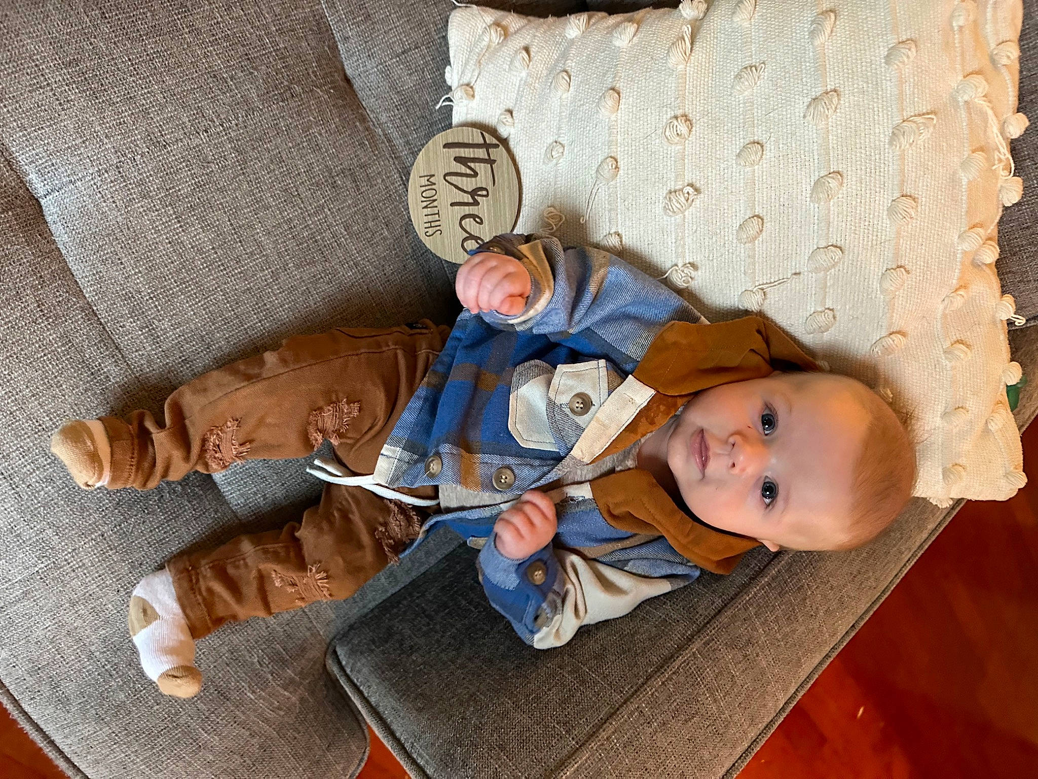 Colter is registered to the contest to win money with this photo: baby, baby_products, baby_toddler_clothing, child, comfort, couch, flooring, headgear, linens, mammal, nap, pattern, person, product, room, sitting, skin, sleep, textile, toddler