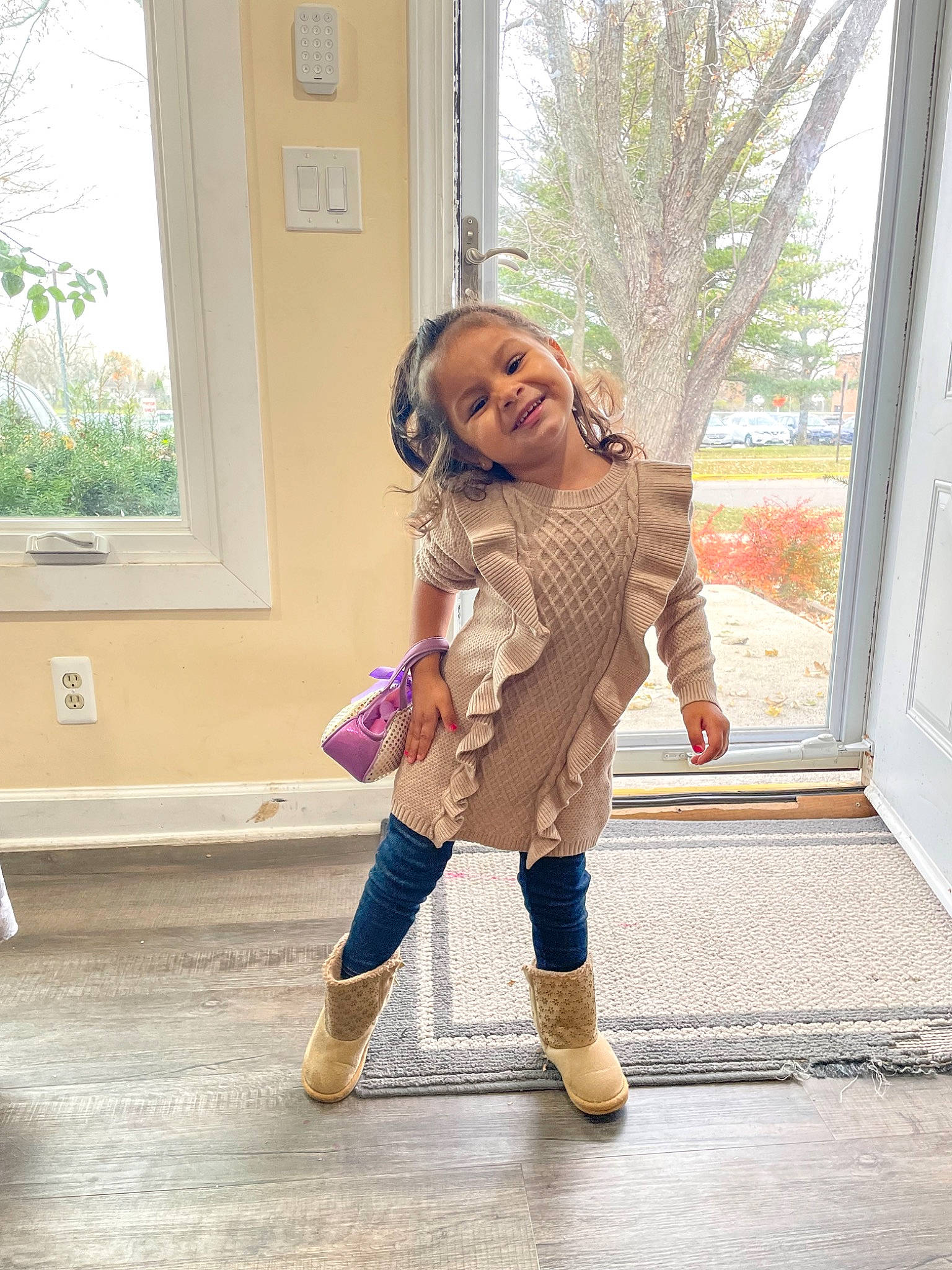 Makayla joined the competition — help win amazing prizes! blond, denim, fashion_design, fawn, flooring, happy, human_leg, joy, knee, leisure, long_hair, outerwear, person, sleeve, smile, thigh, toddler, tree, trunk, waist