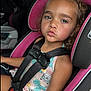 Eliza joined the competition — help win amazing prizes! child, car_seat, seatbelt, curly_hair, pout, pink, black, clothing, vehicle_interior, safety, portrait, young_child, cute, expression, casual, daylight, seat, straps, kid, car