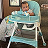 baby, child, infant, high_chair, toy, colorful_toy, sitting, indoors, home, staircase, door, mirror, blanket, floor, furniture, gray_pants, socks, curious, portrait, photography