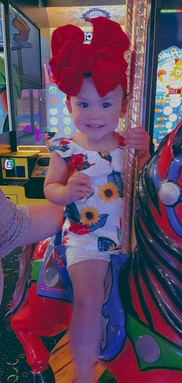 Penelope joined the competition — help win amazing prizes! cheek, child, electric_blue, eye, face, fashion, flower, fun, head, headwear, human_leg, jean_short, joy, magenta, organ, person, pink, plant, shorts, smile