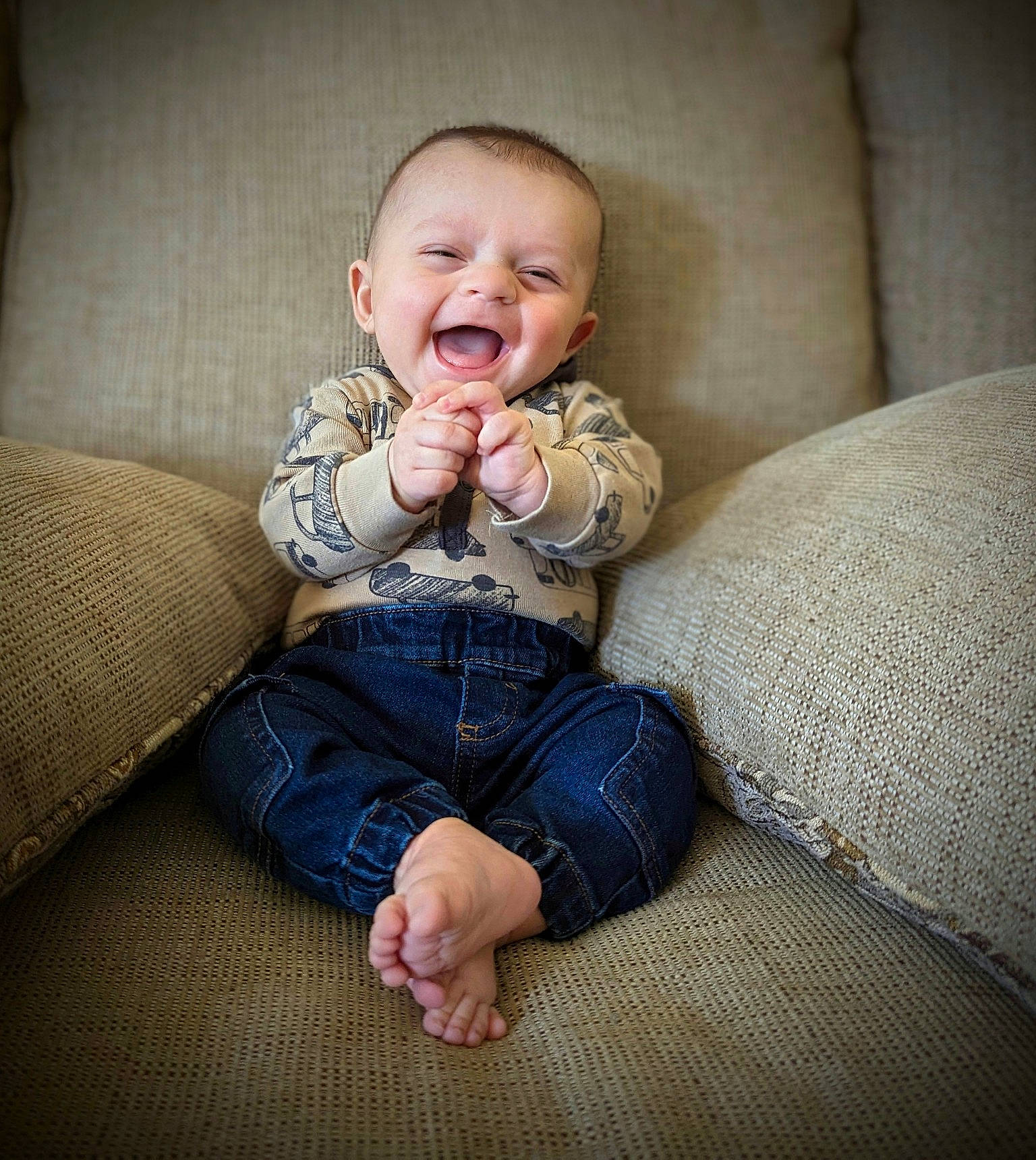 Michael joined the competition — help win amazing prizes! baby, baby_toddler_clothing, cheek, comfort, couch, eye, flash_photography, hand, human_body, iris, leg, lip, mouth, nose, person, skin, sleeve, smile, textile, toddler