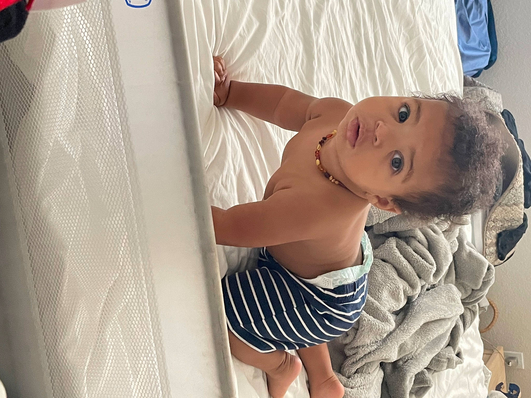 Zander is registered to the contest to win money with this photo: abdomen, baby, chest, child, elbow, flash_photography, gesture, happy, hat, human_body, joint, neck, person, shoulder, skin, stomach, textile, thigh, toddler, trunk