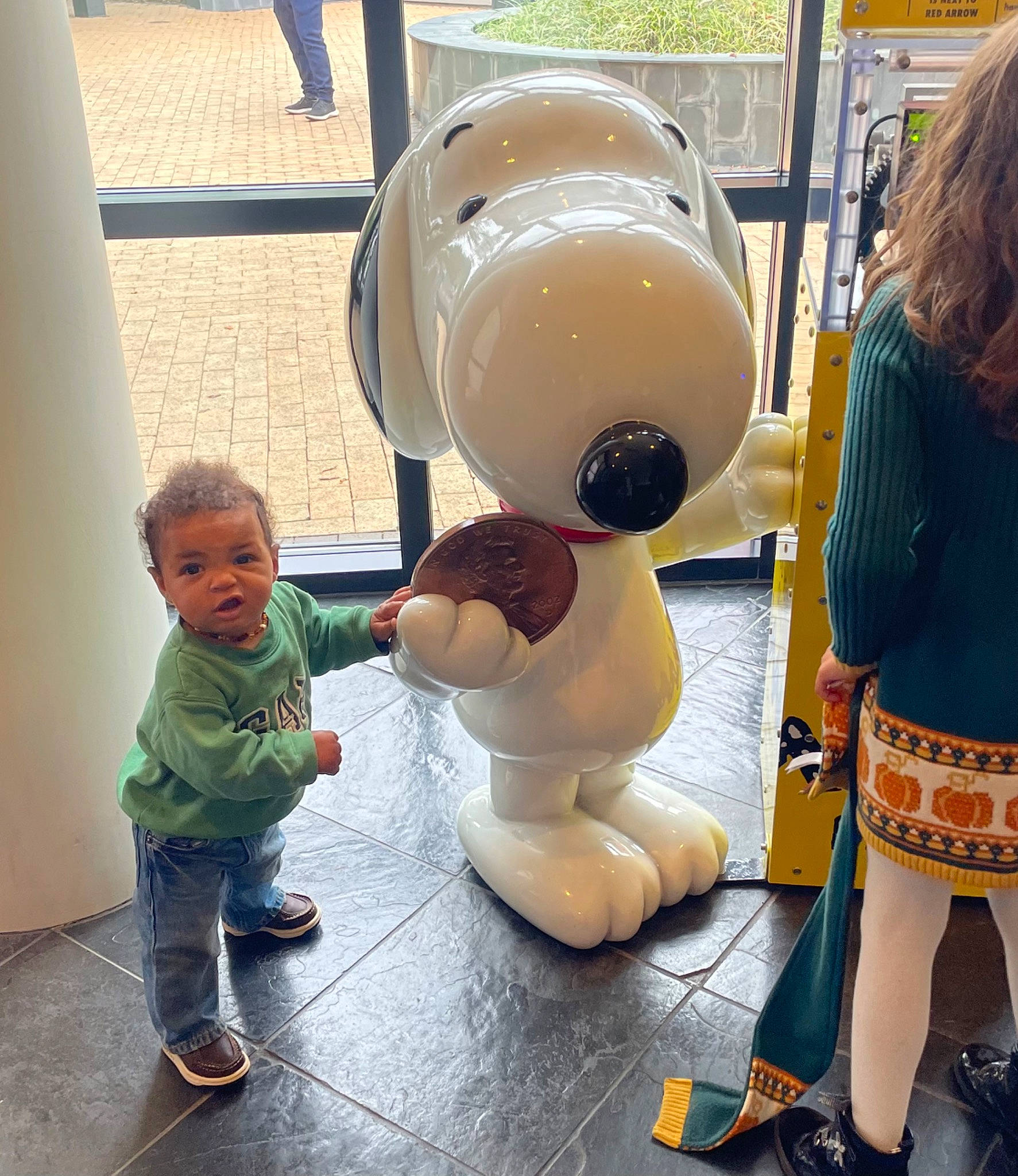 Zander is registered to the contest to win money with this photo: child, cleanliness, flooring, fun, leisure, mascot, person, recreation, toddler, vacation, world