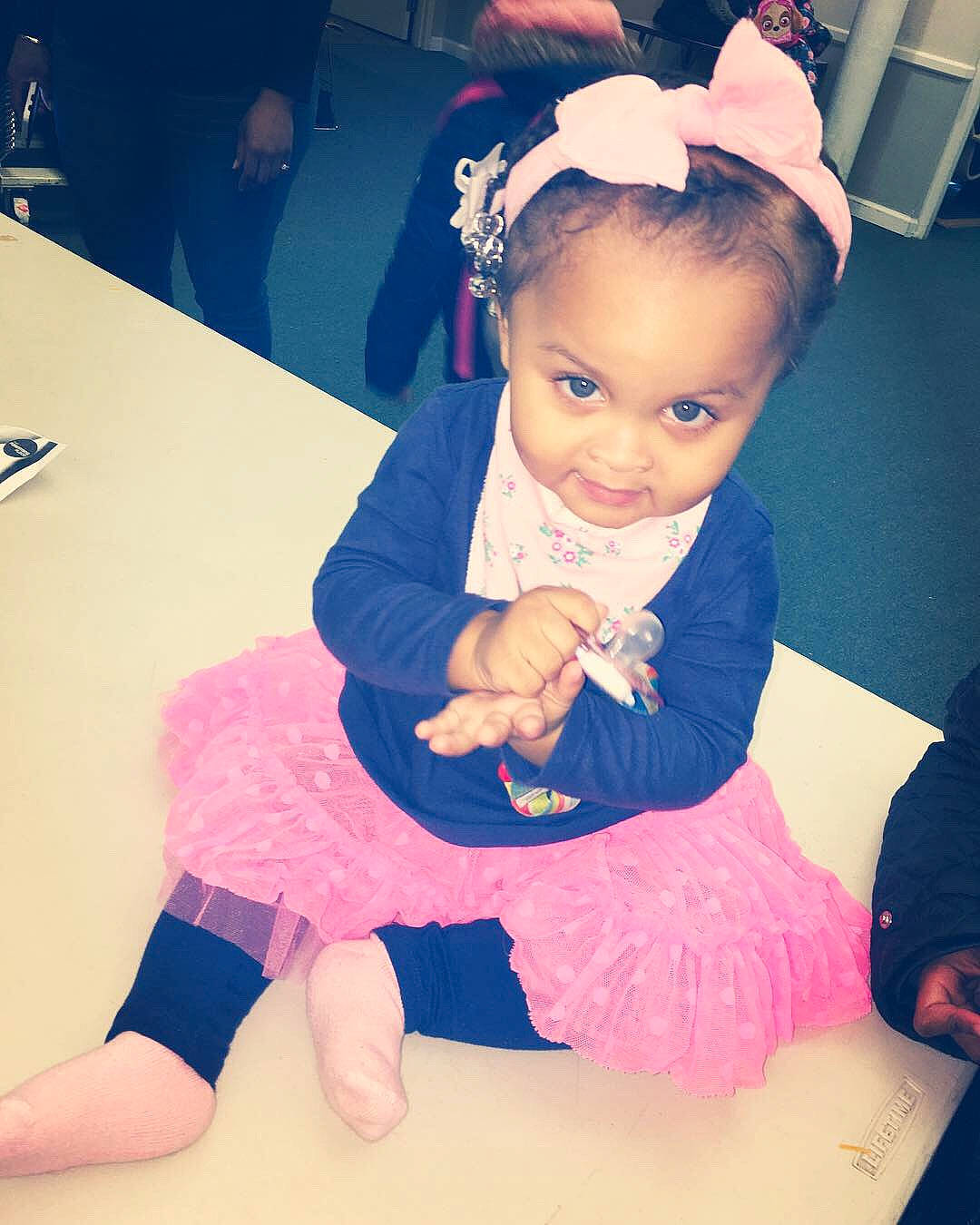 Azaria is registered to the contest to win money with this photo: baby, ballet_tutu, beauty, cheek, child, costume, ear, eye, face, hair_accessory, happy, head, headgear, joy, lip, person, pink, play, shoe, skin