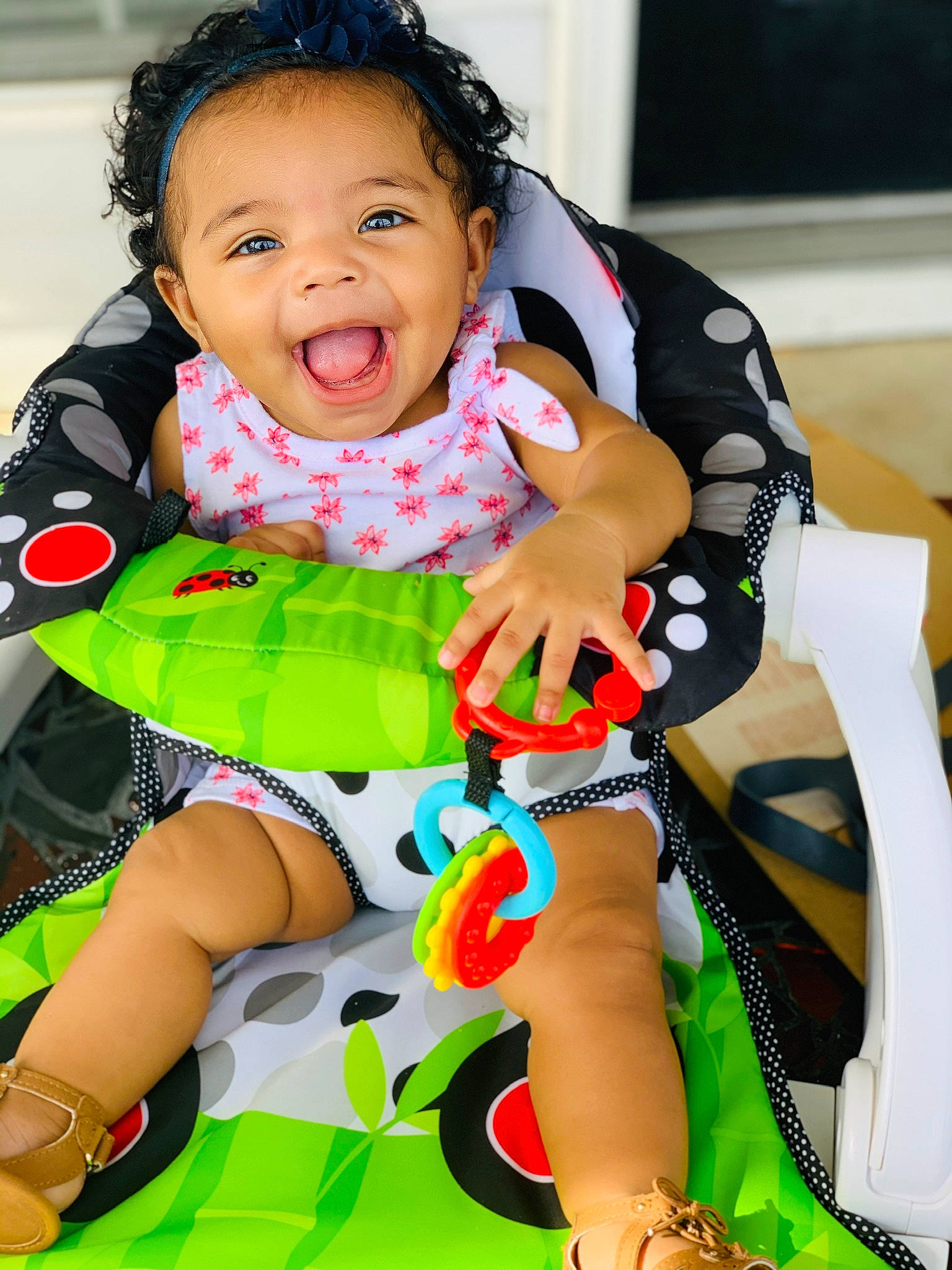 Leilah is registered to the contest to win money with this photo: baby, child, leg, person, play, product, sitting, skin, toddler