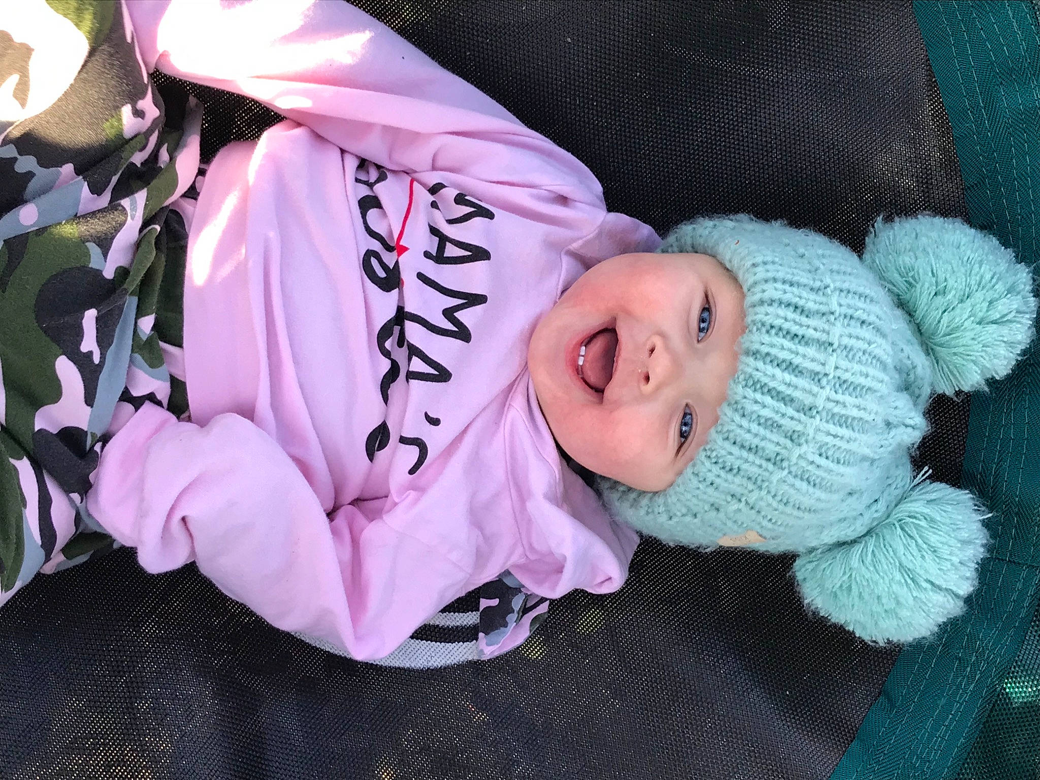 Zenleigh is registered to the contest to win money with this photo: baby, baby_toddler_clothing, cap, happy, hat, headgear, headwear, knit_cap, magenta, outerwear, person, pink, plant, product, purple, smile, textile, toddler, tree, violet