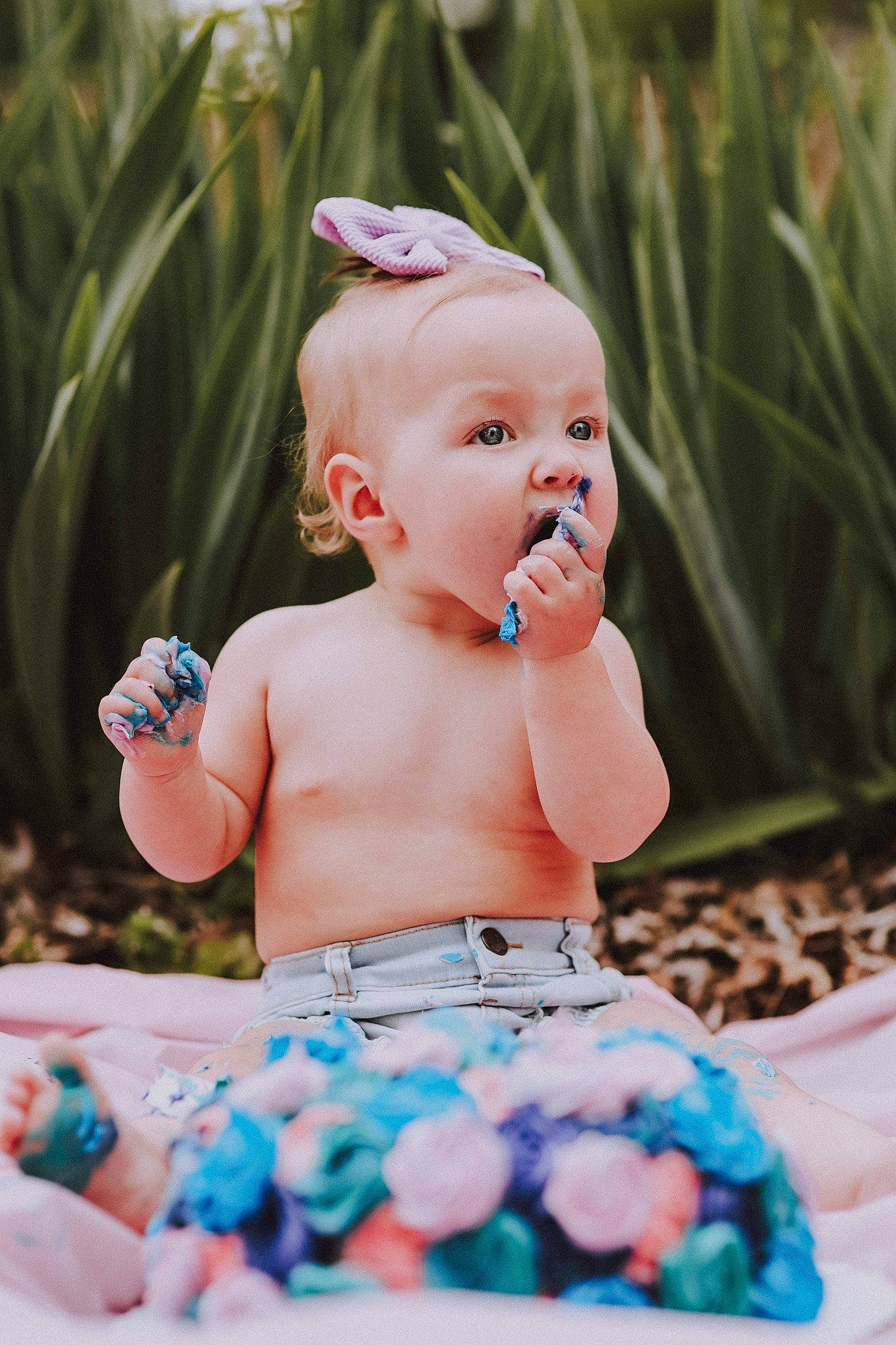 Zenleigh is registered to the contest to win money with this photo: aqua, azure, baby, baby_products, baby_toddler_clothing, blue, child, electric_blue, event, fun, grass, happy, headpiece, jewellery, leisure, pattern, person, pink, plant, skin