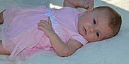 Harper is registered to the contest to win money with this photo: baby, baby_products, baby_toddler_clothing, cheek, child, eye, hand, head, iris, lip, pink, product, skin, toddler
