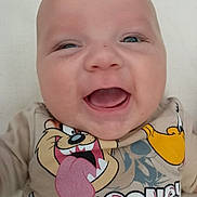 Thomas joined the competition — help win amazing prizes! baby, smiling, face, child, looney_tunes, taz, daffy_duck, clothing, cartoon, tongue, cute, happy, portrait, infant, person, sitting, apparel, closeup, head, light_background