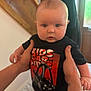 Michael joined the competition — help win amazing prizes! baby, child, toddler, hands, black_tshirt, car_graphic, indoor, wooden_stairs, door, person, holding, cute, face, eyes, shorts, home, skin, portrait, infant, young_child