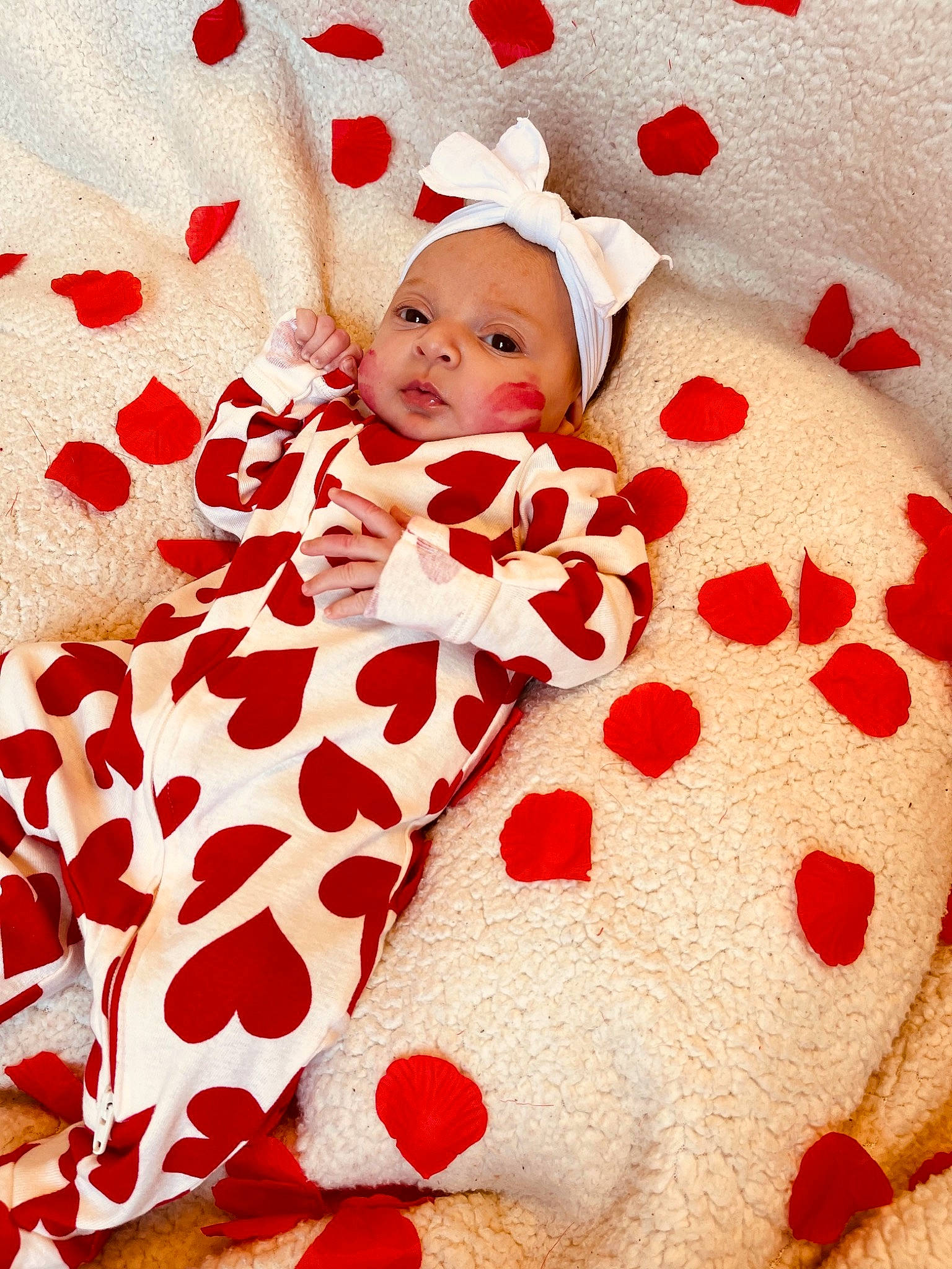 Laylani is registered to the contest to win money with this photo: baby, baby_sleeping, baby_toddler_clothing, carmine, child, collar, comfort, event, face, happy, linens, mammal, pattern, peach, person, pink, red, sleeve, toddler, vertebrate