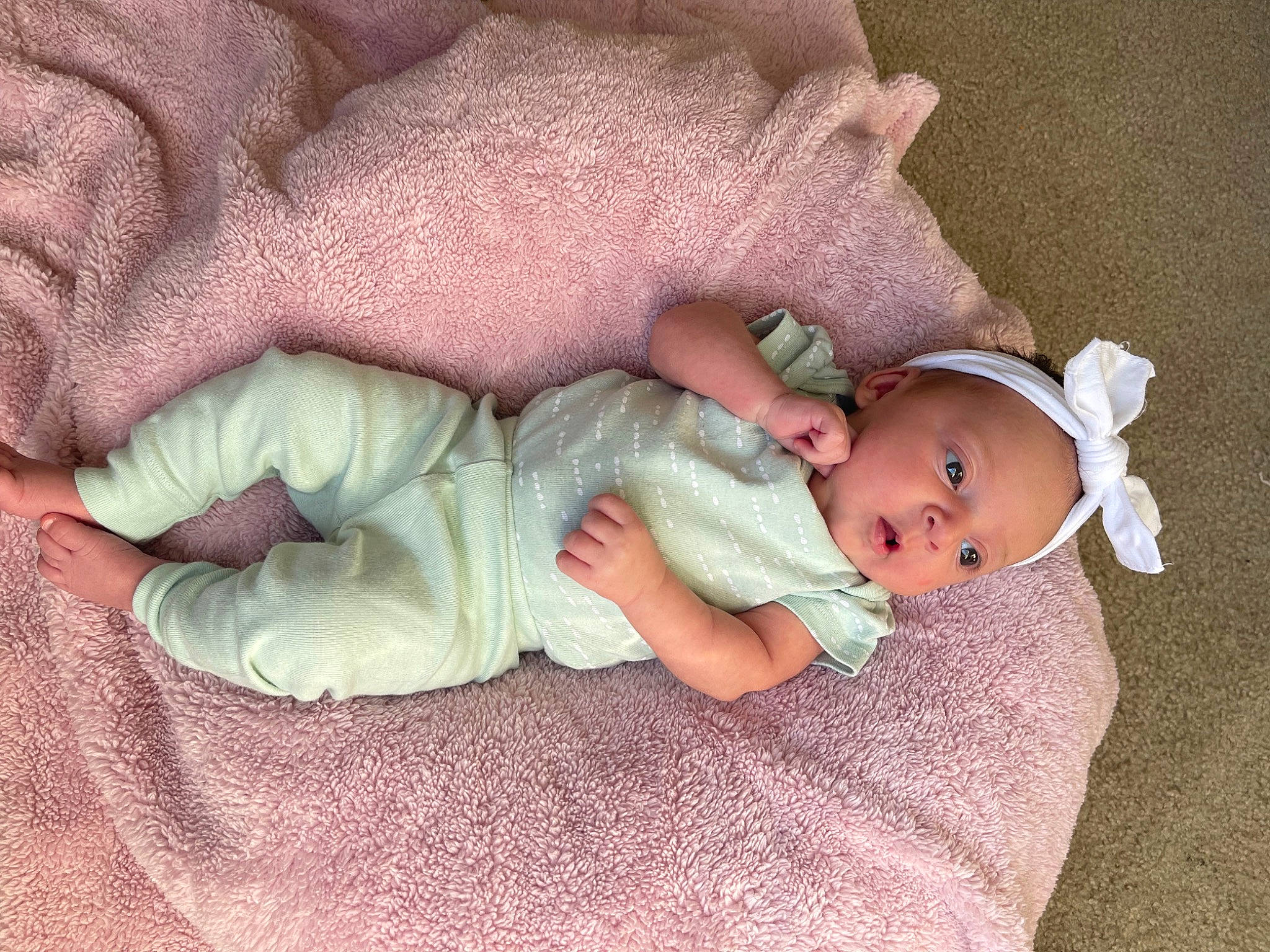 Laylani is registered to the contest to win money with this photo: baby, baby_products, baby_sleeping, baby_toddler_clothing, cheek, child, comfort, face, finger, hand, head, human_body, linens, person, product, room, sitting, skin, sleeve, toddler