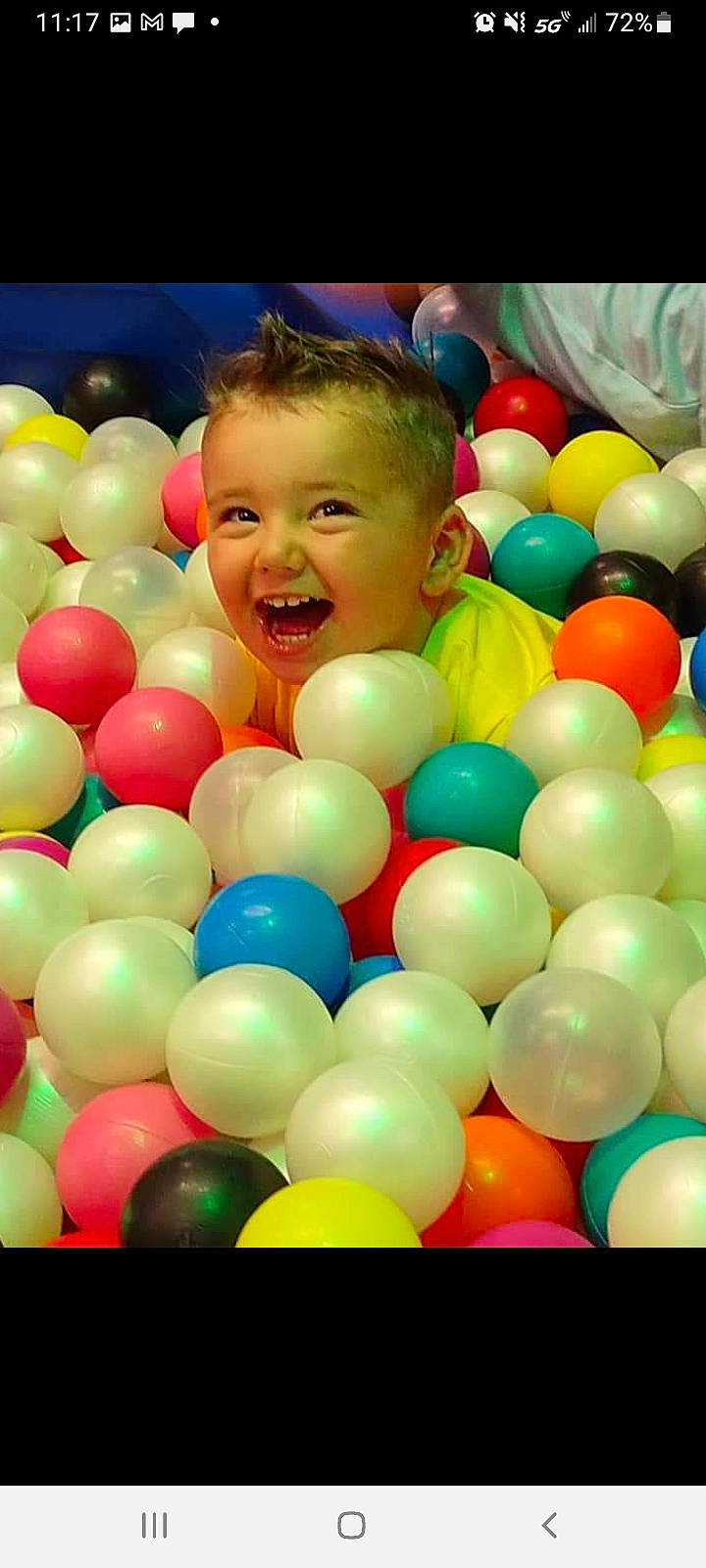 Bryce joined the competition — help win amazing prizes! ball, ball_pit, balloon, child, circle, event, facial_expression, fun, happy, leisure, mixture, party_supply, person, plastic, play, playing_sports, product, recreation, smile, toddler