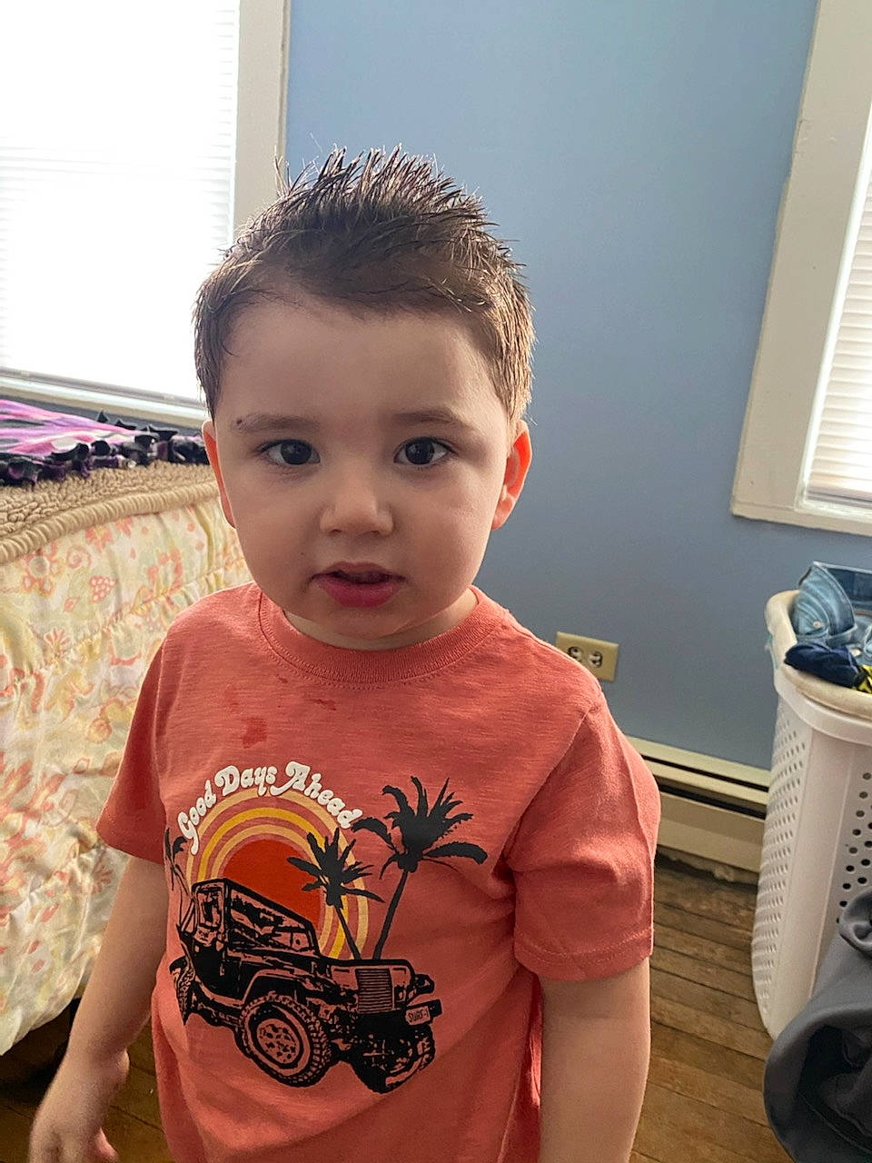 Bryce is registered to the contest to win money with this photo: baby, baby_toddler_clothing, chest, child, cool, eyelash, flooring, fun, hairstyle, happy, head, neck, pattern, person, skin, sleeve, standing, t_shirt, toddler, visual_arts