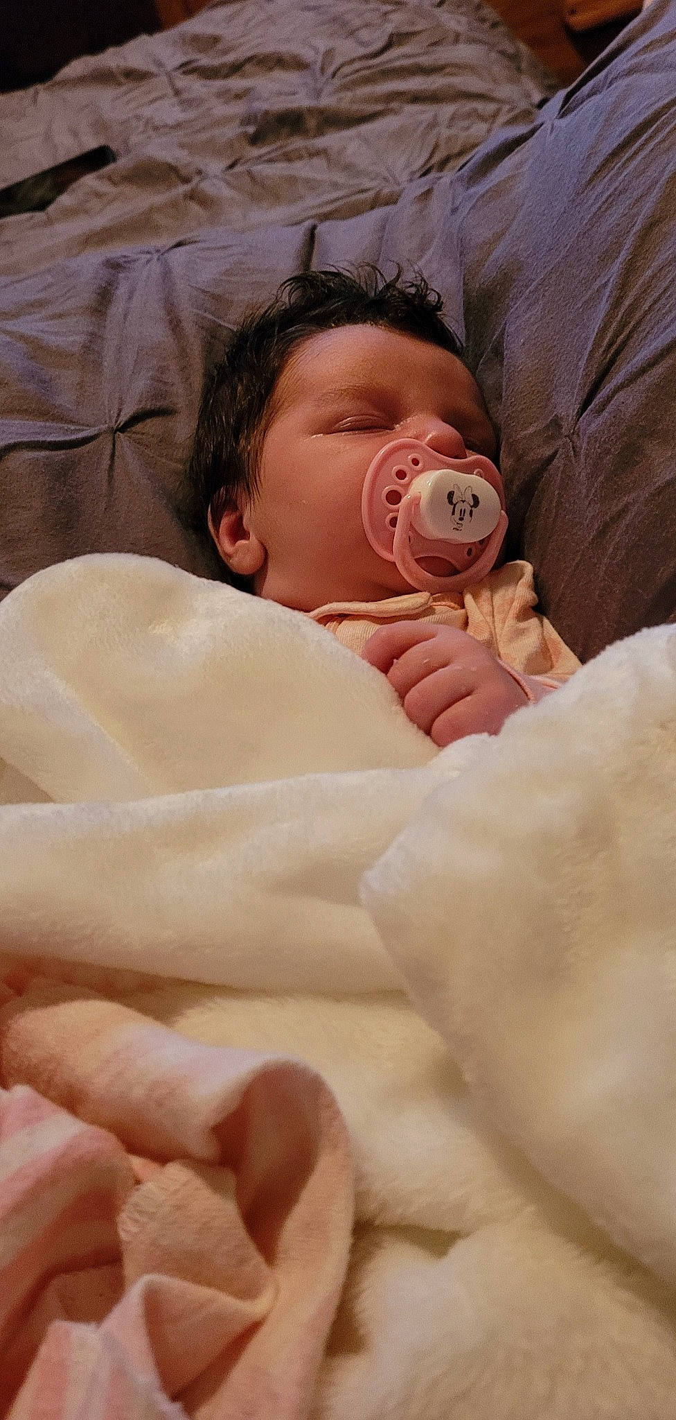 Ariella is registered to the contest to win money with this photo: baby, baby_products, baby_sleeping, baby_toddler_clothing, bedding, bedtime, cheek, child, comfort, eyebrow, head, human_body, linens, nail, neck, nose, person, pink, skin, thumb