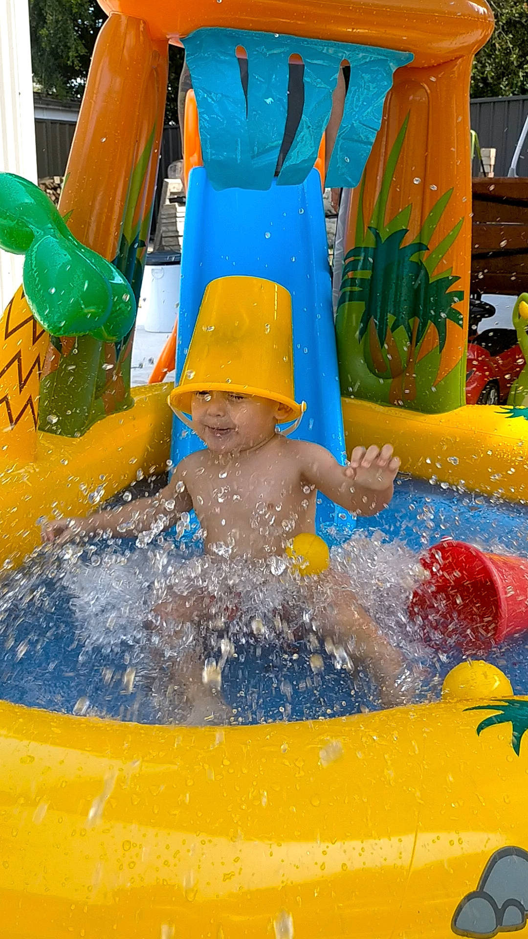 Pax is registered to the contest to win money with this photo: amusement_park, bathing, blue, child, chute, fun, games, headwear, inflatable, leisure, leisure_centre, nonbuilding_structure, outdoor_play_equipment, outdoor_recreation, person, play, playground, recreation, swimming_pool, toddler