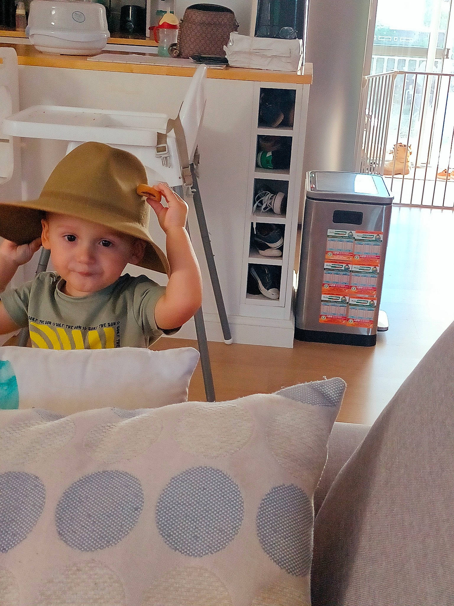 Pax joined the competition — help win amazing prizes! baby, baby_toddler_clothing, baseball_cap, cap, cardboard, child, design, flooring, hat, headwear, joy, linens, machine, pattern, person, play, room, shelving, sitting, smile