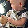 Julian is registered to the contest to win money with this photo: baby, car_seat, blanket, teddy_bear, sleeping, child, infant, seatbelt, soft_toy, sunlight, peaceful, cute, side_profile, clothing, indoors, portrait, love, comfort, nap, toddler