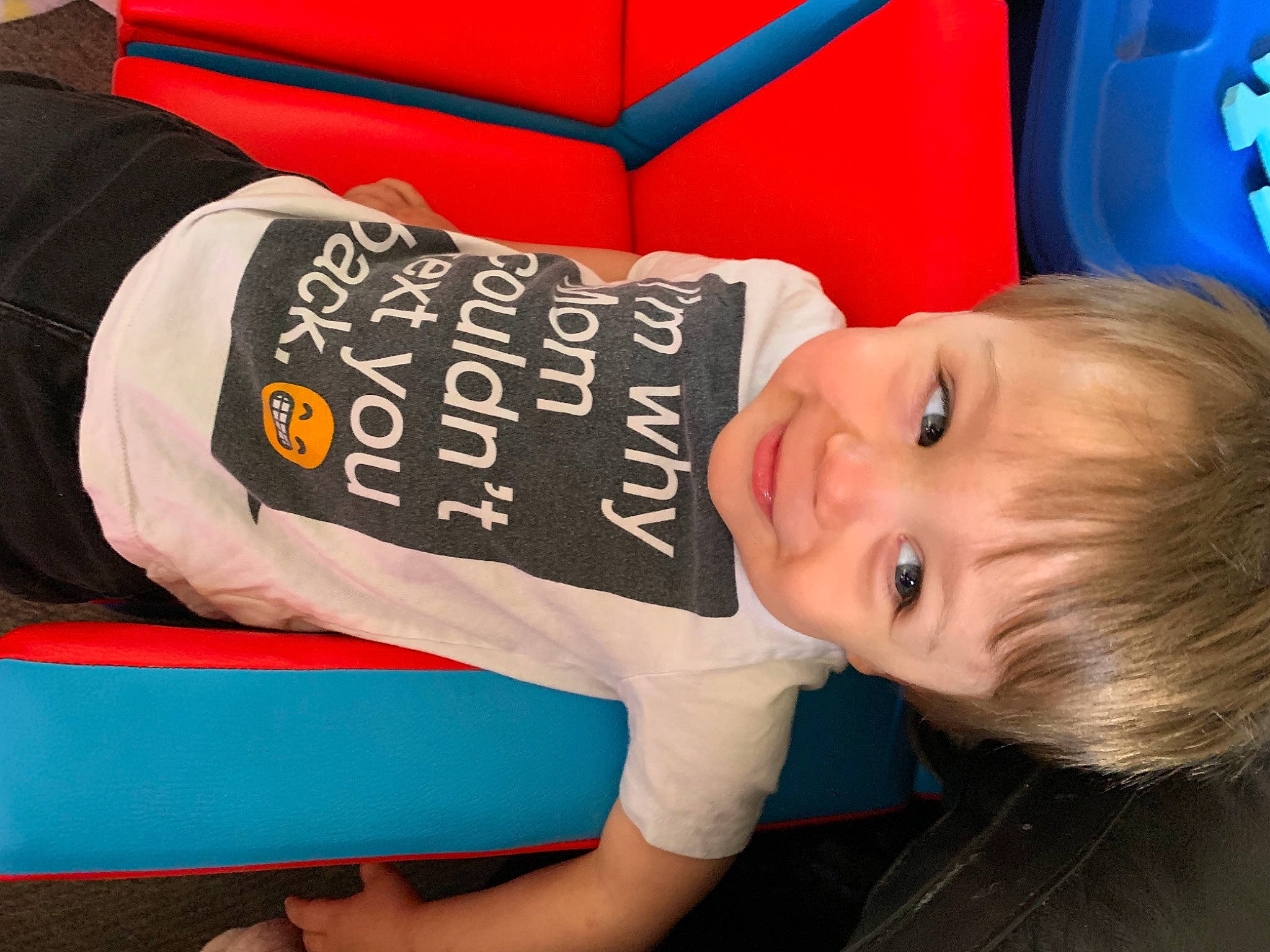 Westley joined the competition — help win amazing prizes! baby_toddler_clothing, blue, child, comfort, elbow, electric_blue, fun, happy, joy, leisure, logo, person, red, room, sitting, sleeve, smile, t_shirt, toddler, wrist