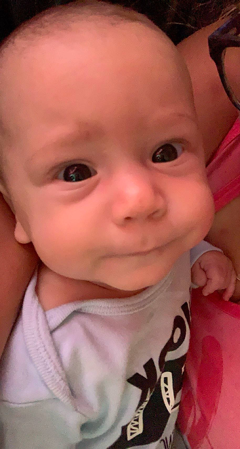 Braxtyn is registered to the contest to win money with this photo: baby, baby_toddler_clothing, cheek, chin, ear, eye, eyebrow, eyelash, facial_expression, finger, forehead, hairstyle, human_body, iris, lip, mouth, nose, person, pink, skin